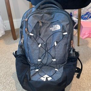black and grey borealis north face back pack